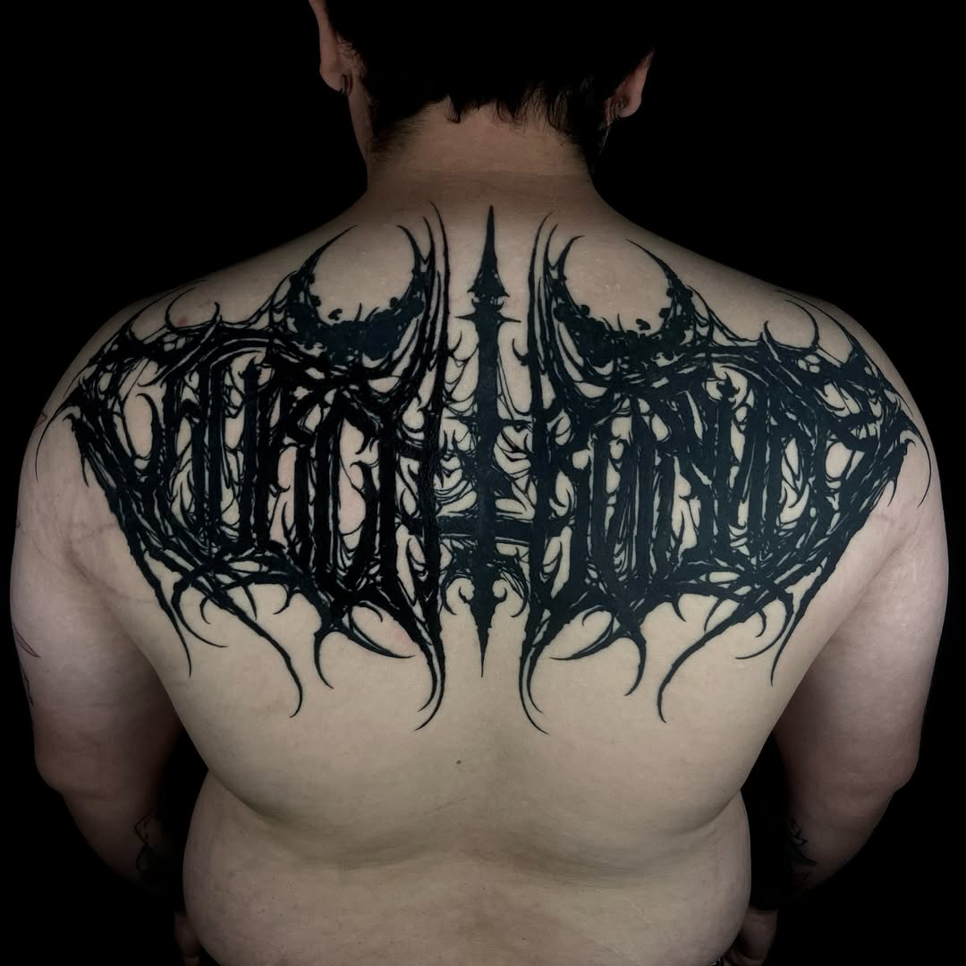 Tattoo by @baptism_black — lettering_script, blackwork