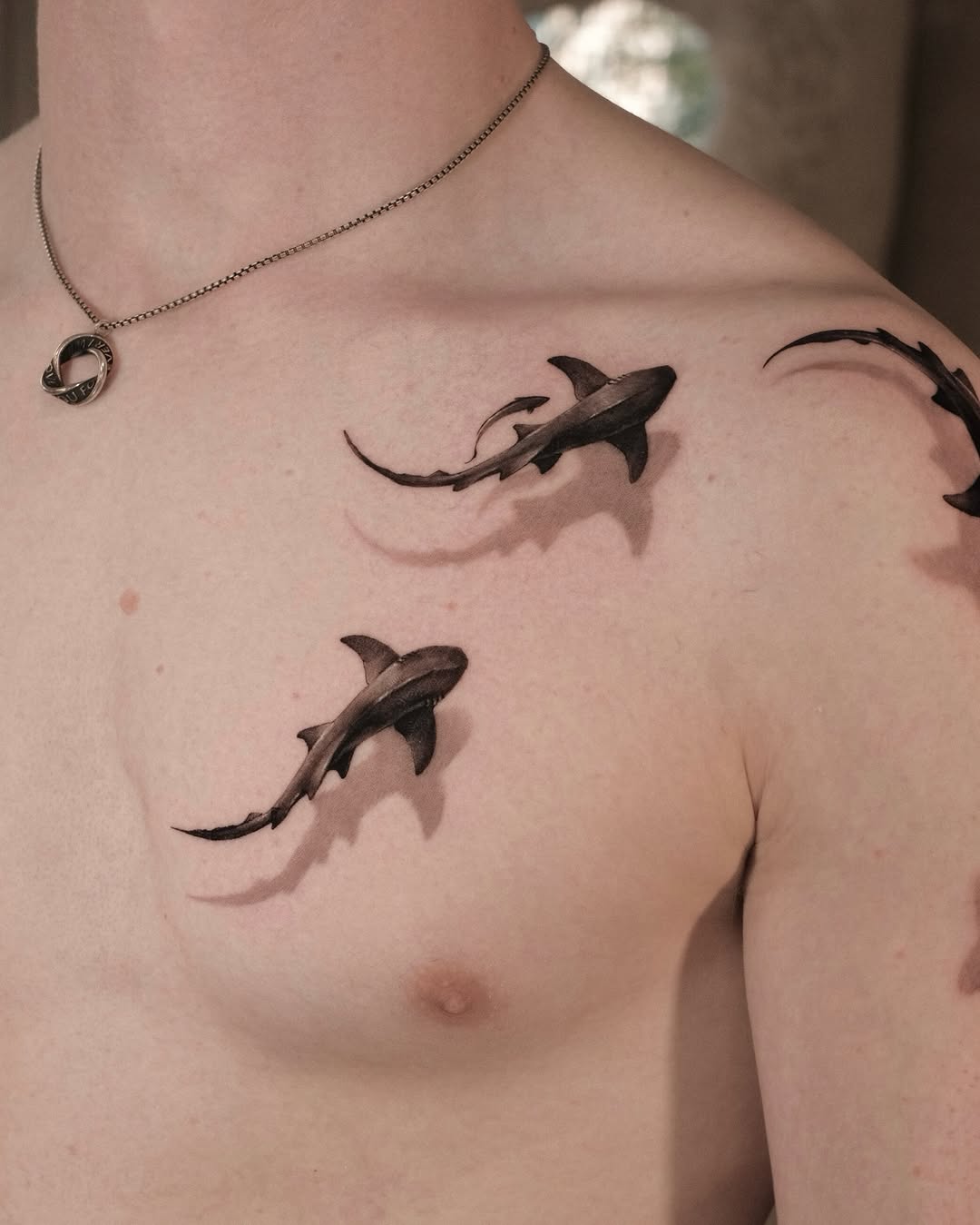 Tattoo by @dionne.tattoo โ realism, black_and_grey