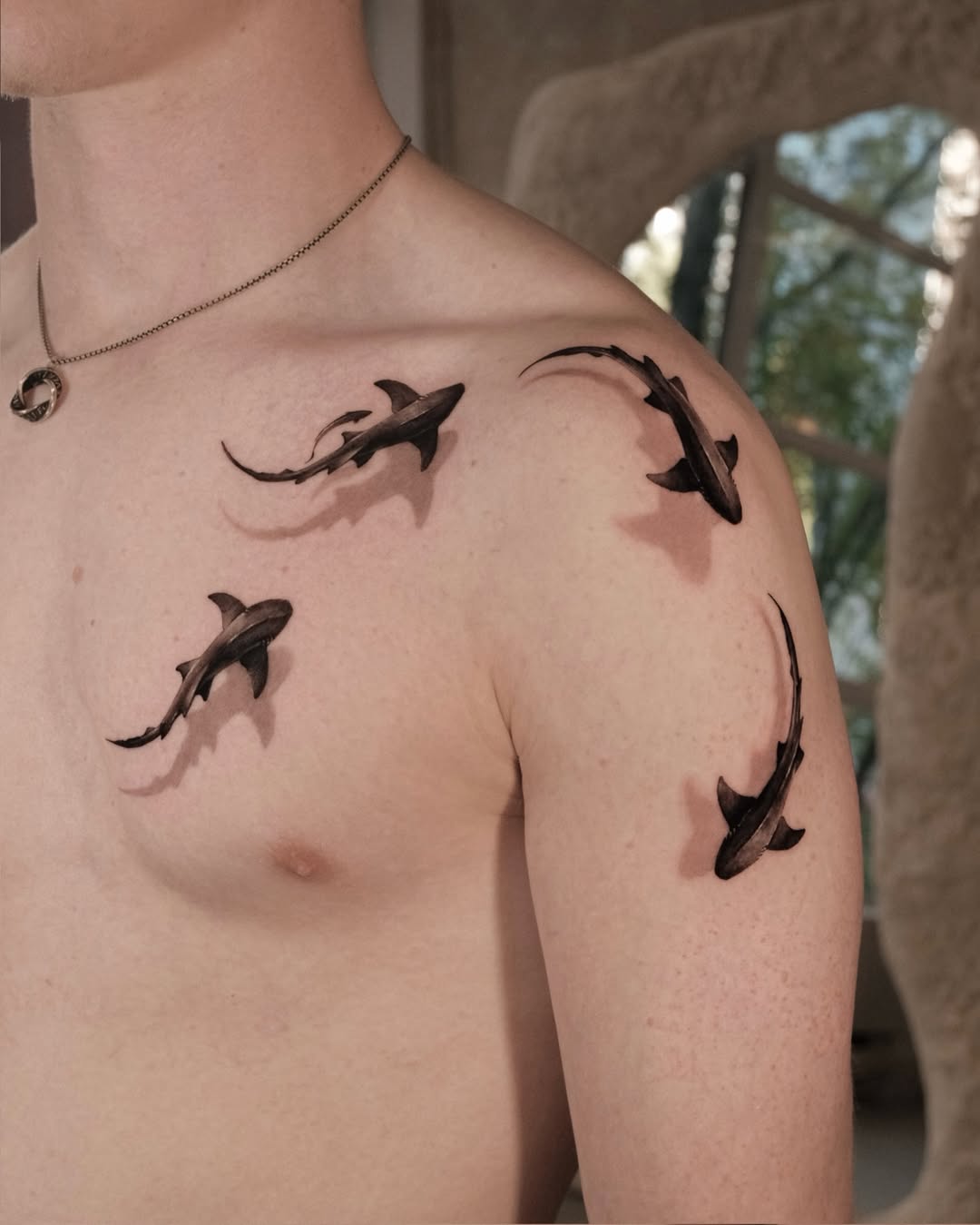 Tattoo by @dionne.tattoo โ realism, black_and_grey