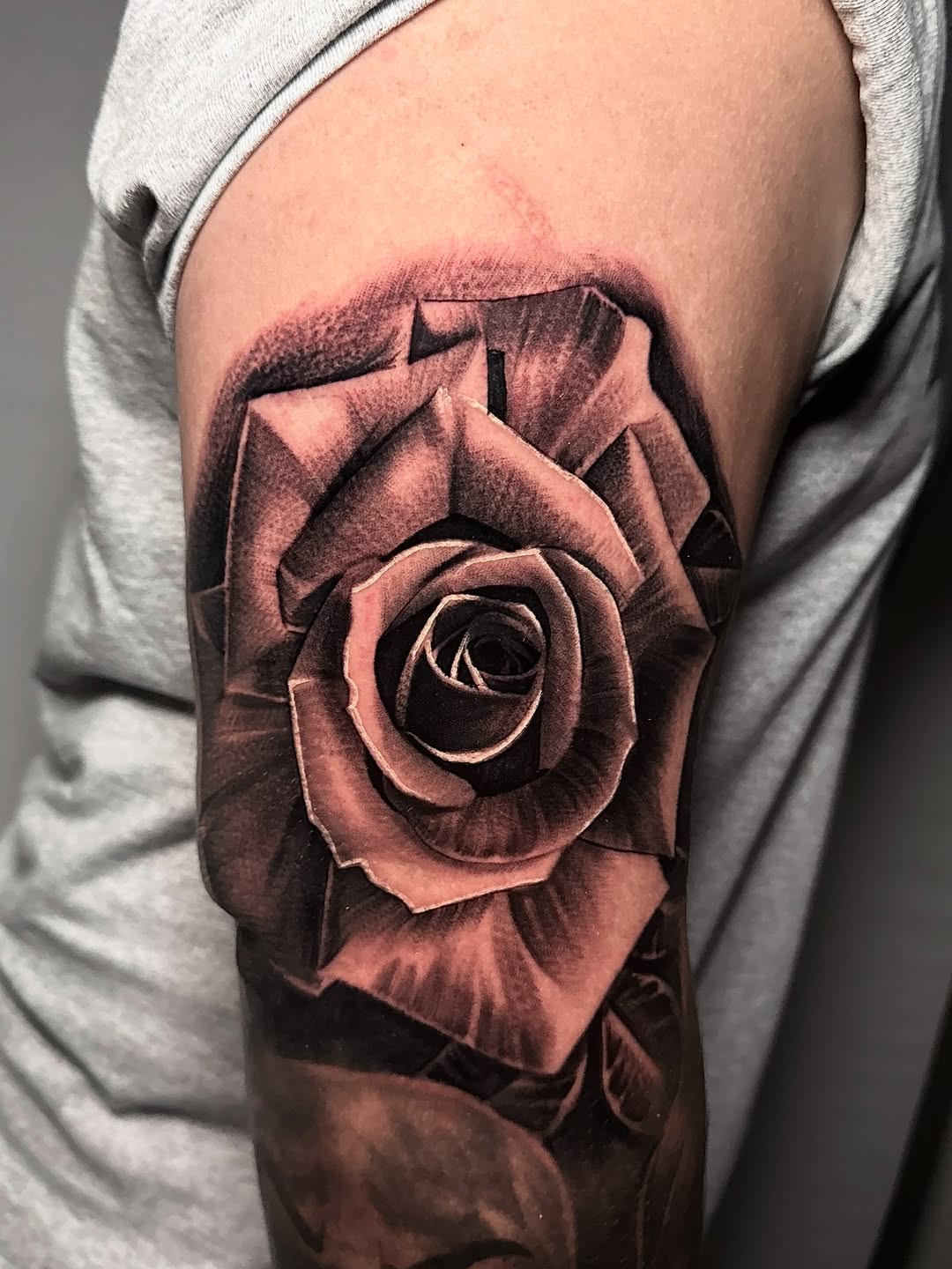 Tattoo by @tattoo_isaac562 โ realism, black_and_grey