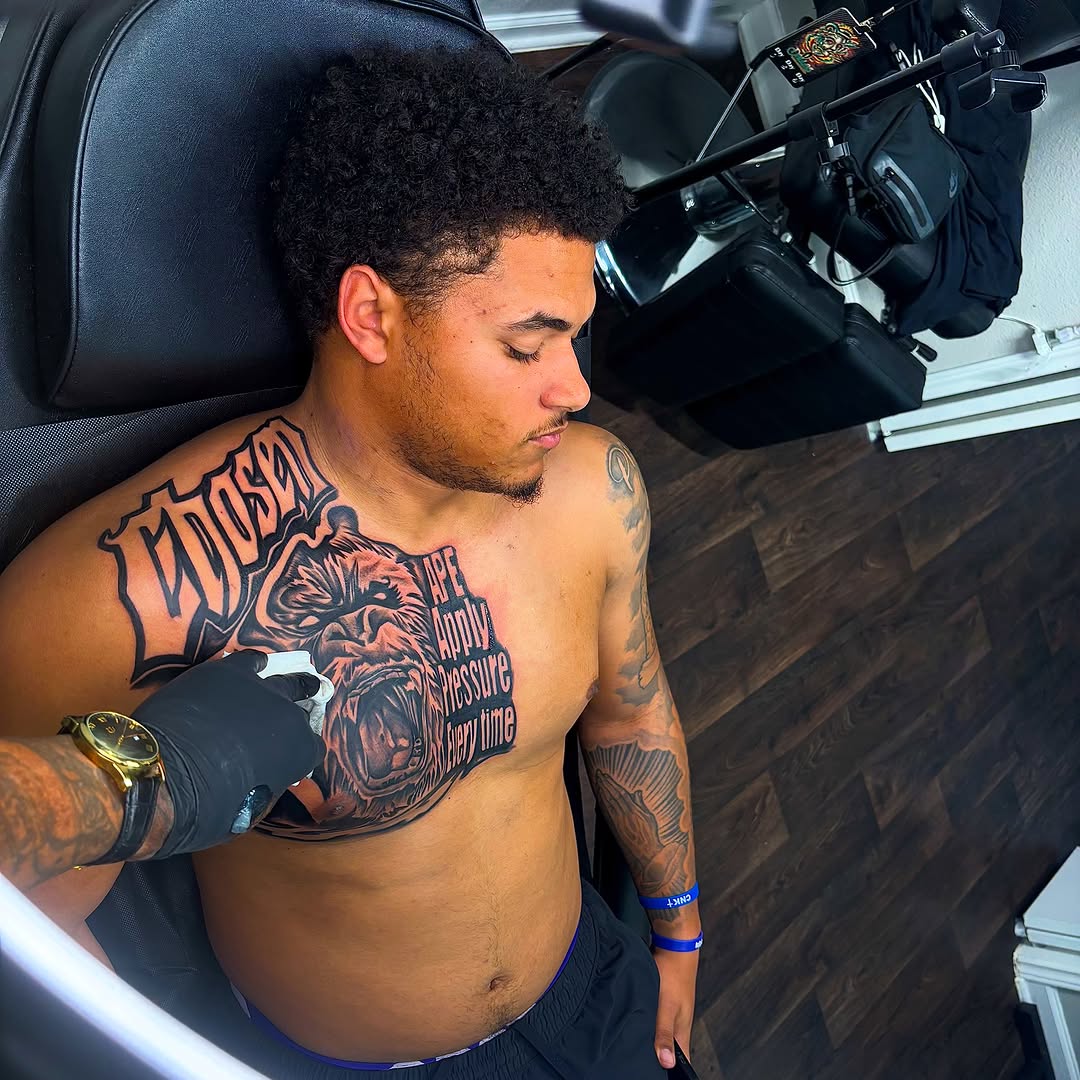 Tattoo by @officialdwaynedurham_ink — black_and_grey, lettering_script