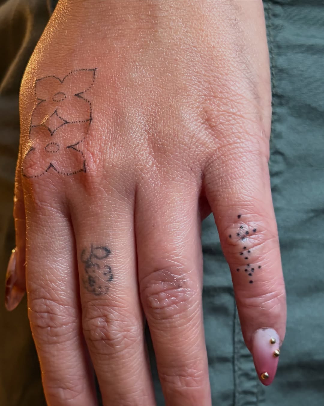 Tattoo by @drawnfromemories — fine_line, dotwork