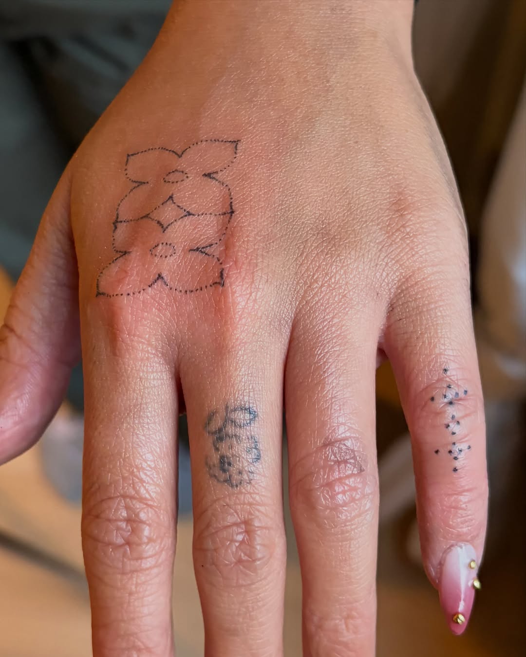 Tattoo by @drawnfromemories — fine_line, dotwork