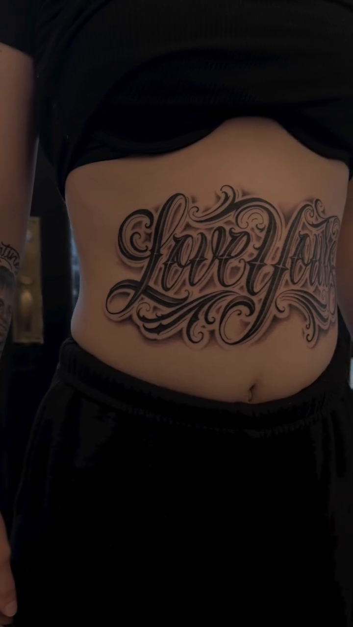 Tattoo by @anheartistxo — lettering_script, chicano