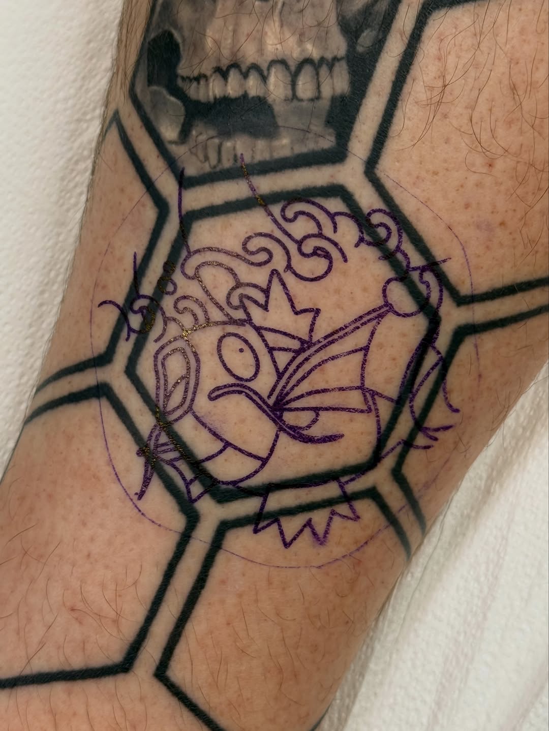 Tattoo by @rileynors.inks — geometric, illustrative