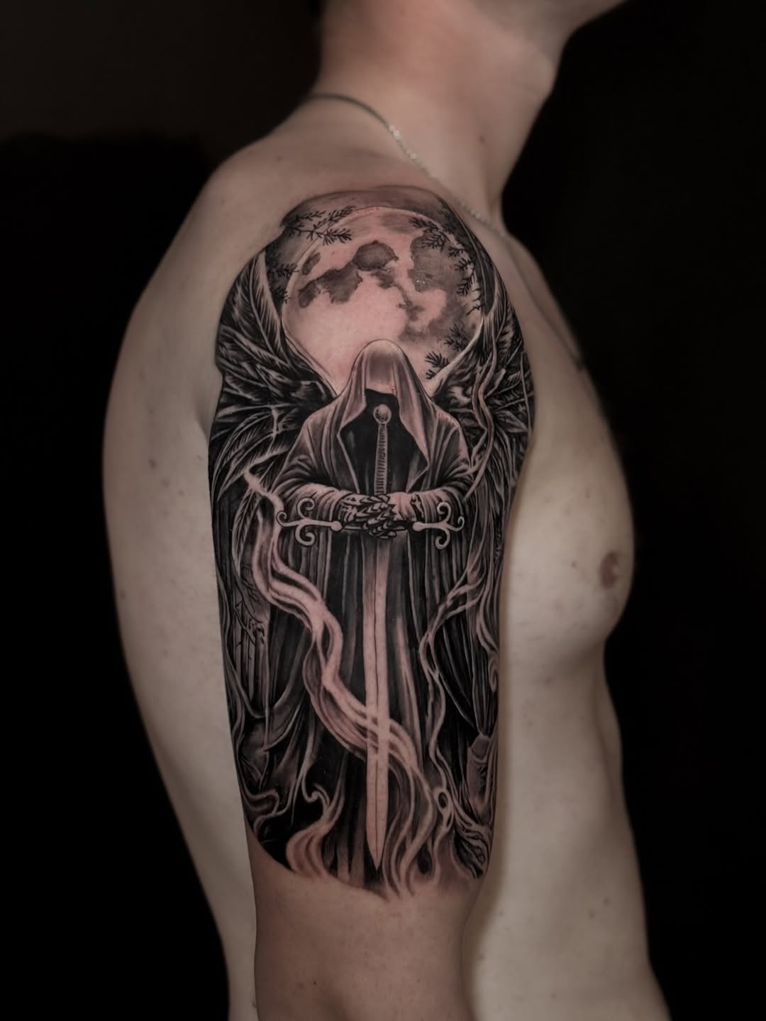 Tattoo by @tuantran.ink — black_and_grey, realism