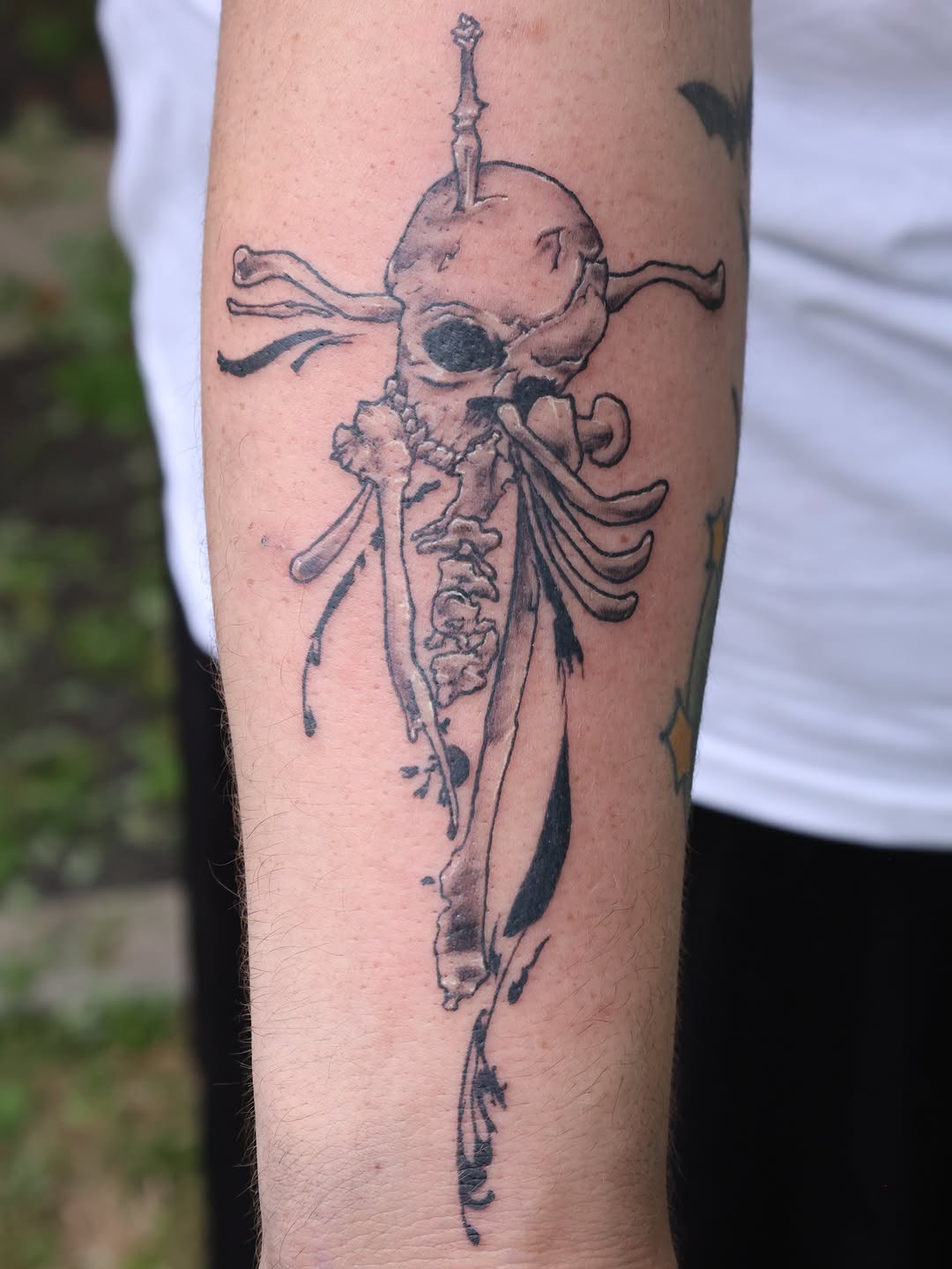 Tattoo by @loui_lays_ink — black_and_grey, dark_realism