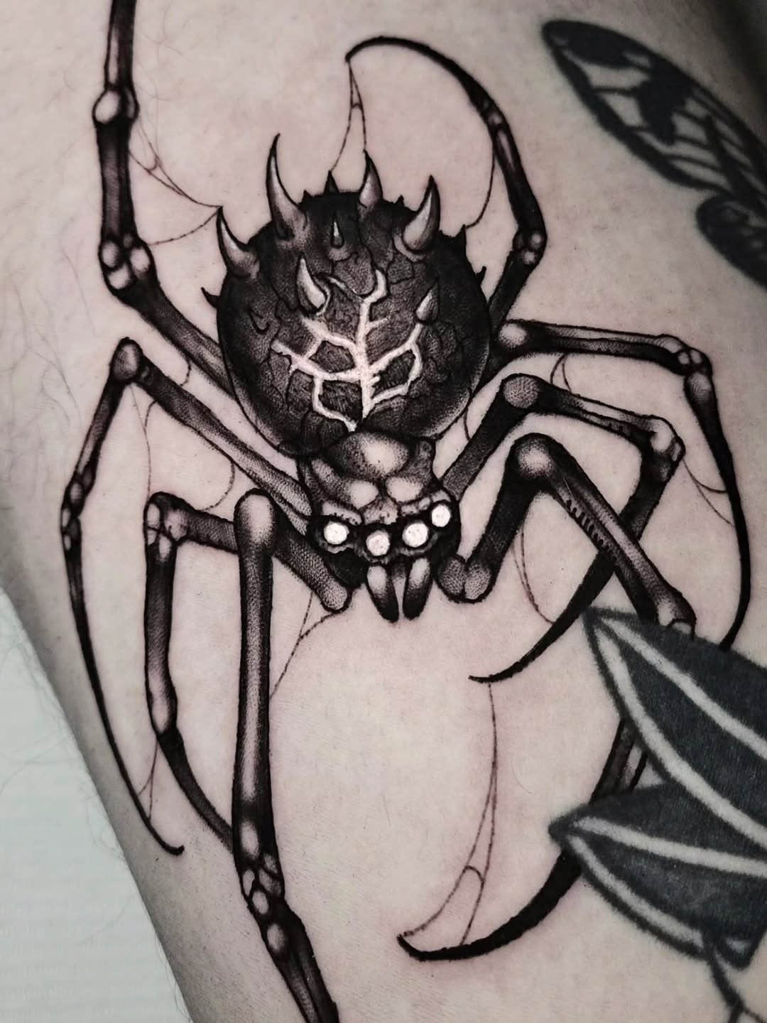 Tattoo by @zombrietattoos — blackwork, illustrative