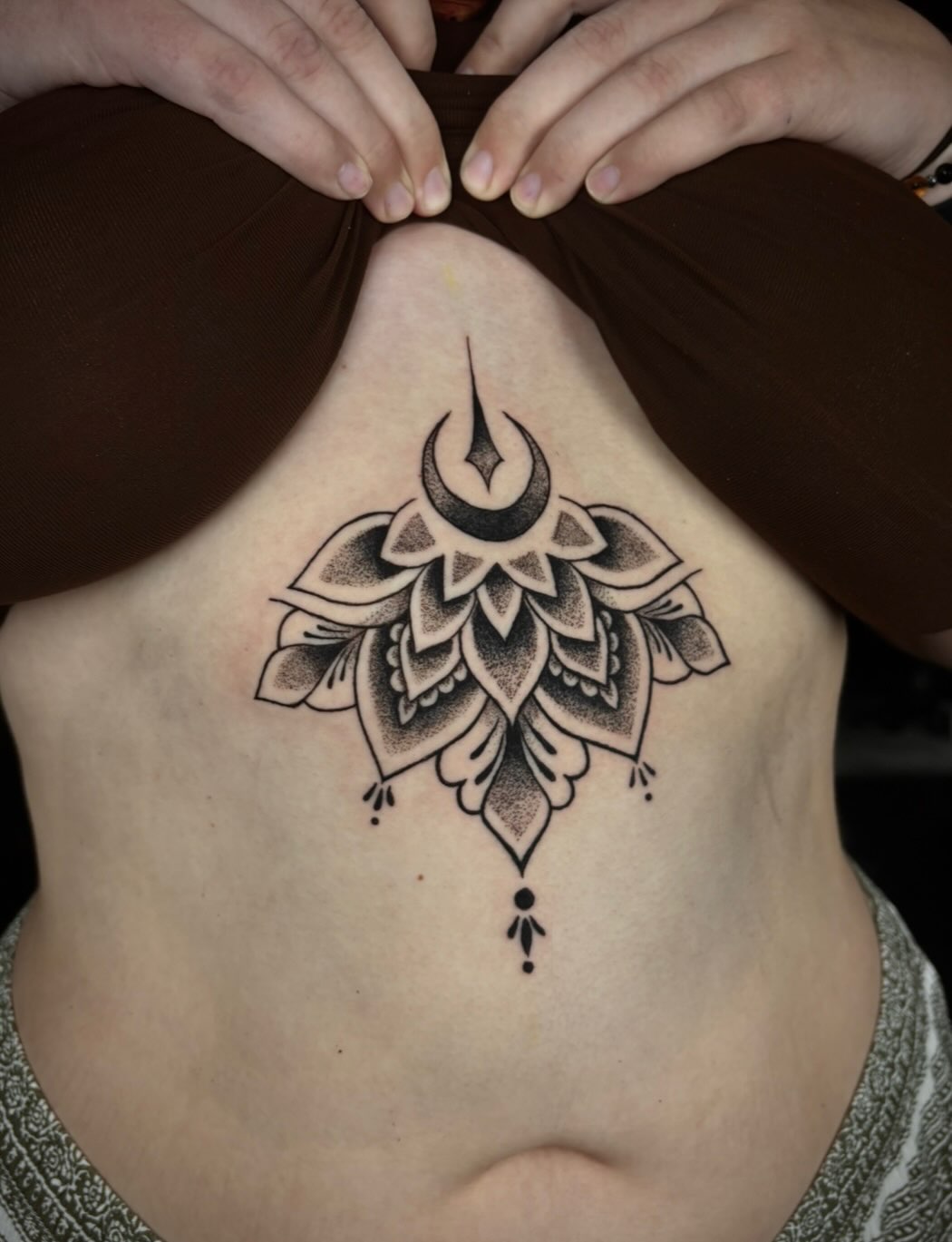 Tattoo by @cryptid.tattoo — dotwork, ornamental