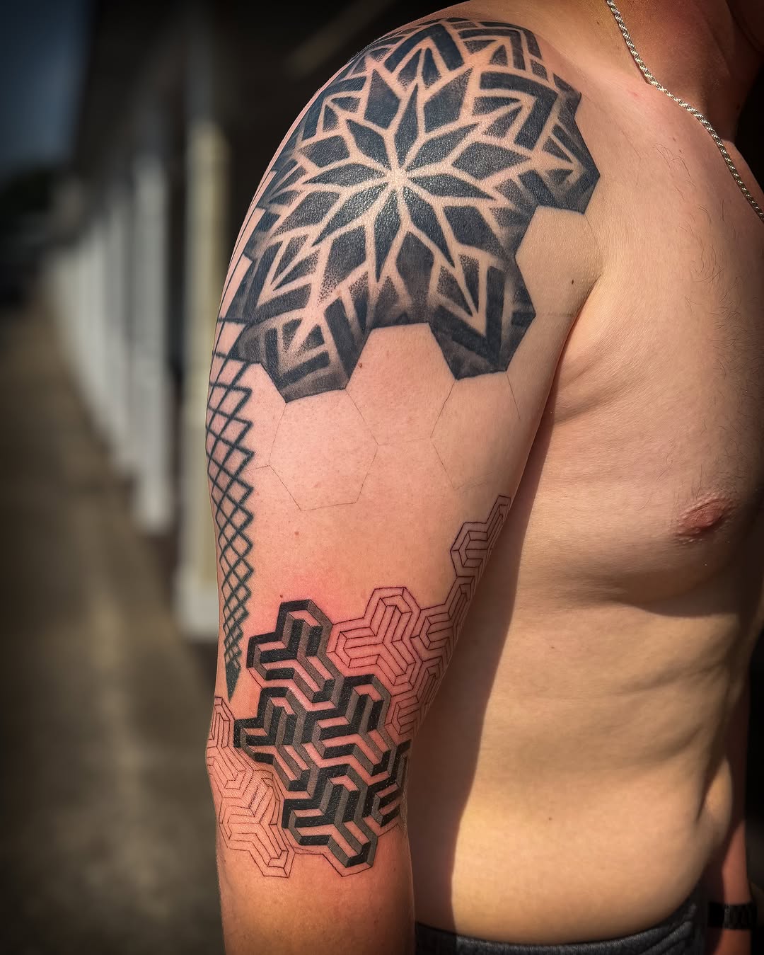 Tattoo by @tatsbyjesse — geometric, dotwork