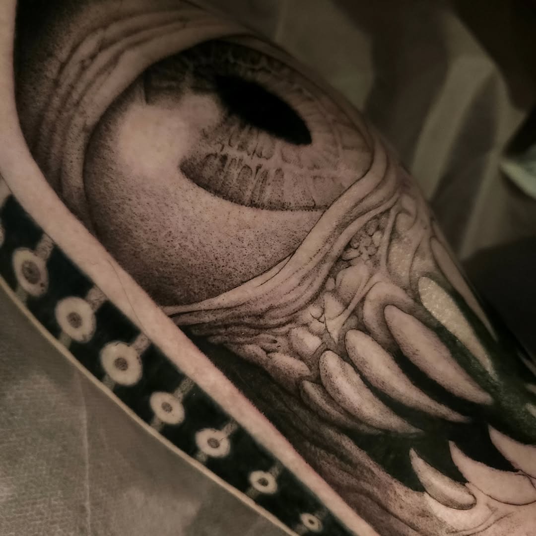 Tattoo by @swirly.boi — realism, black_and_grey