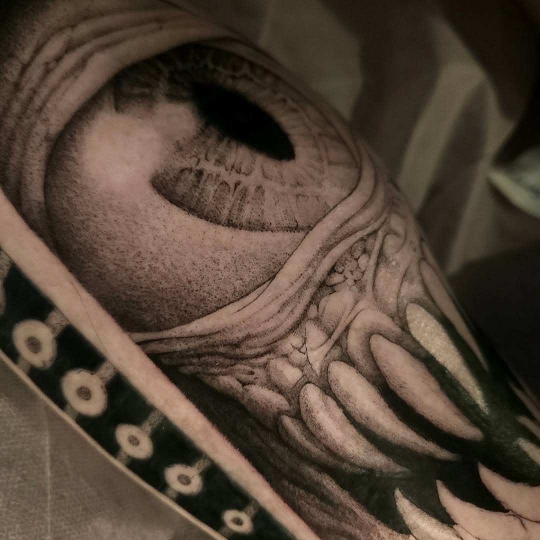 Tattoo by @swirly.boi — realism, black_and_grey
