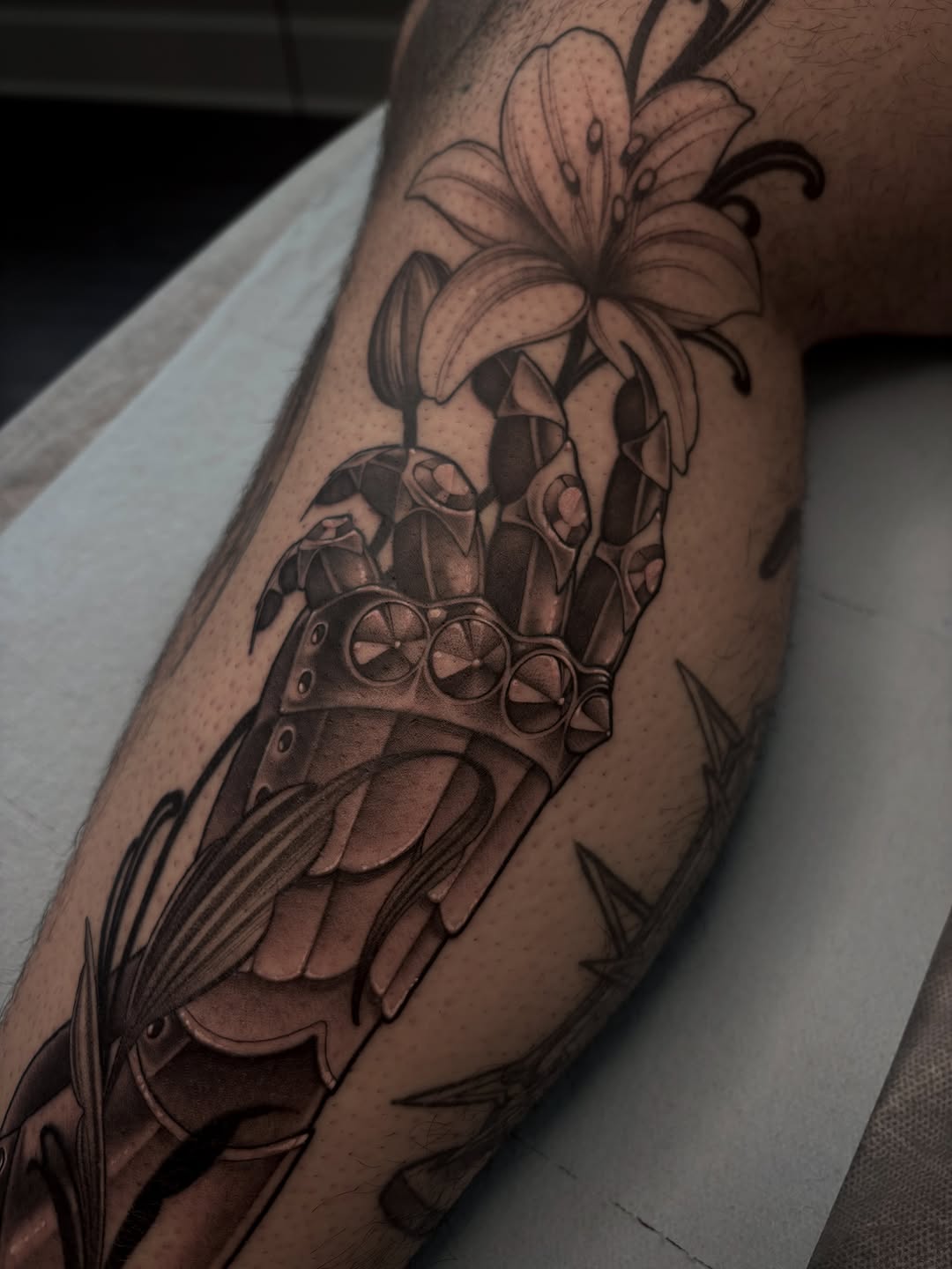 Tattoo by @tattoosbymeach — black_and_grey, realism