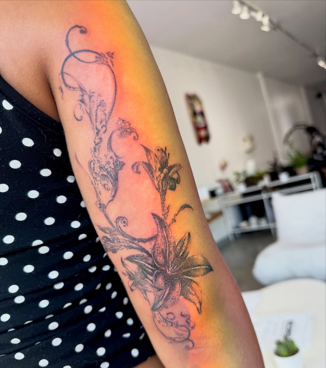 Tattoo by @avas.aesthetics__ — black_and_grey