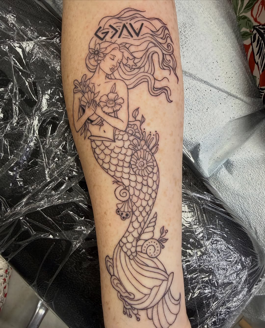 Tattoo by @edweird.art — fine_line, lettering_script
