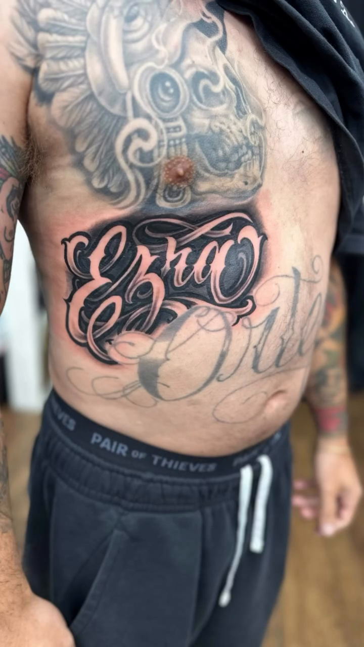 Tattoo by @rubenruiz_tattoos — lettering_script, blackwork