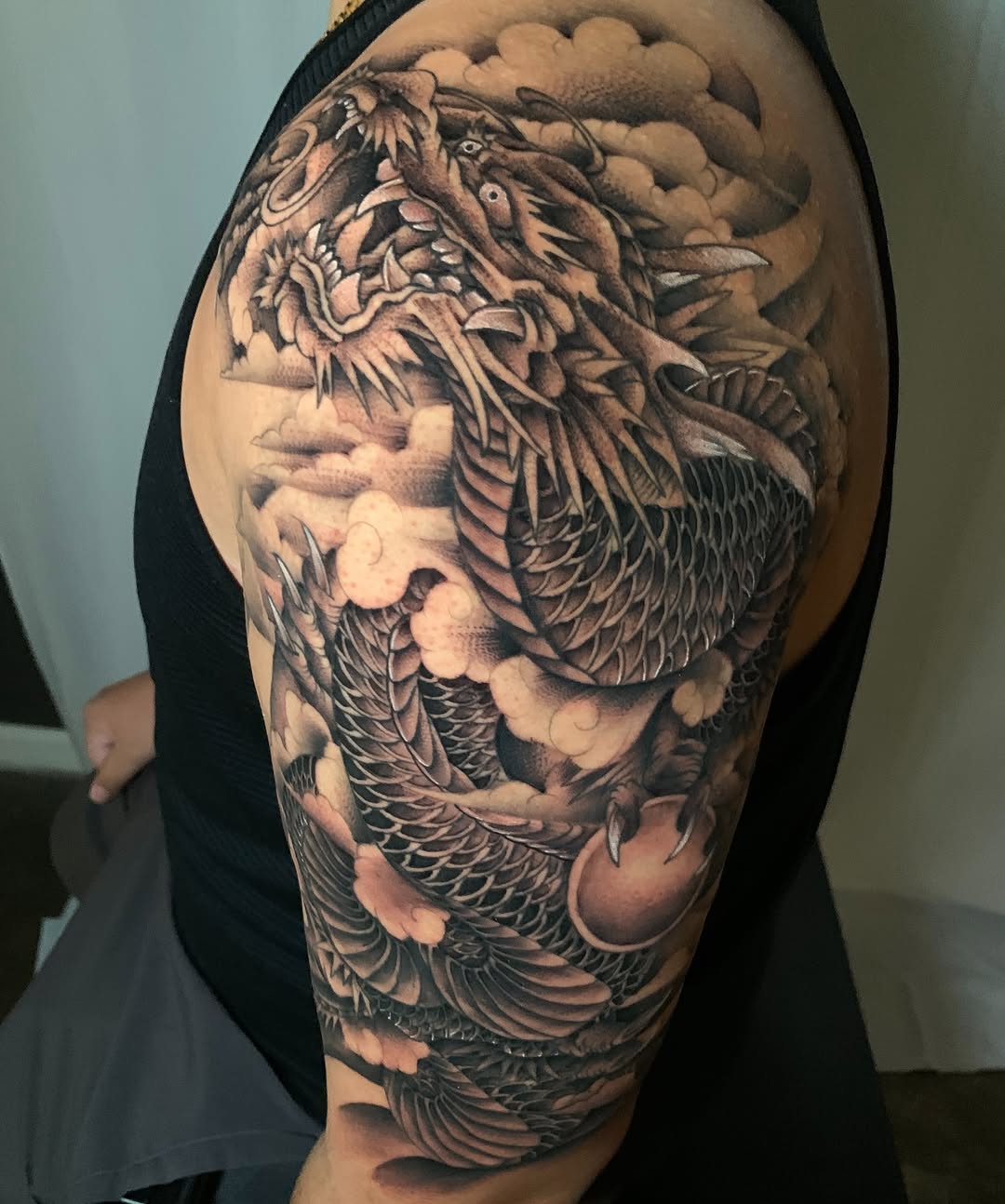 Tattoo by @bodyartbycuda — japanese_irezumi, black_and_grey