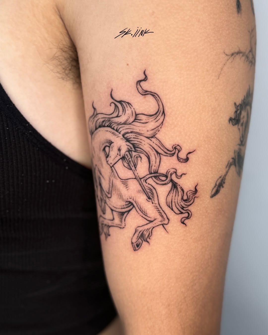 Tattoo by @sk.iink — illustrative, fine_line