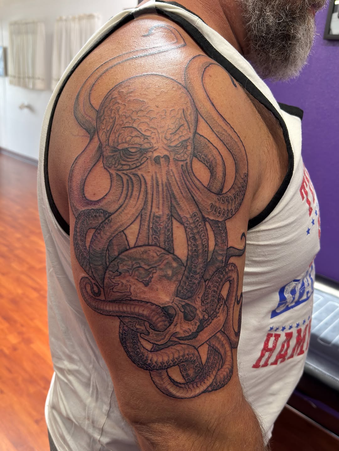 Tattoo by @tosh.pointo.tattoos — black_and_grey, realism
