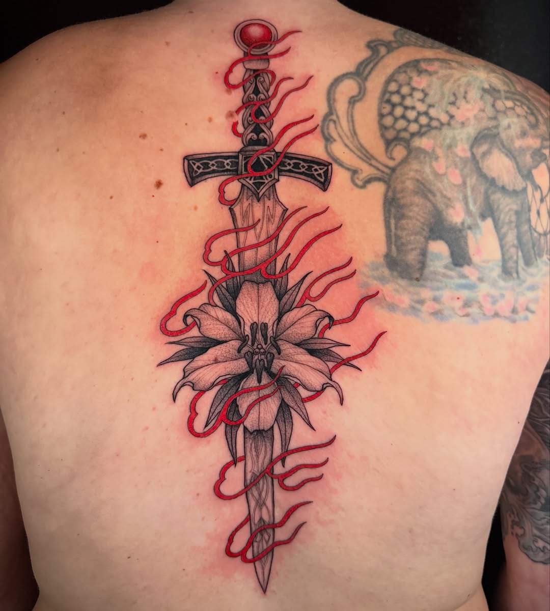 Tattoo by @etzeltattoo — black_and_grey, fine_line