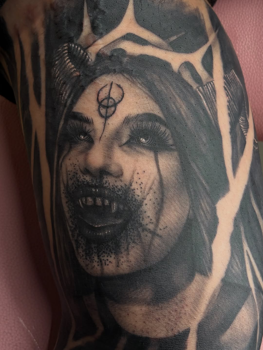 Tattoo by @inkedbycahela — dark_realism, black_and_grey