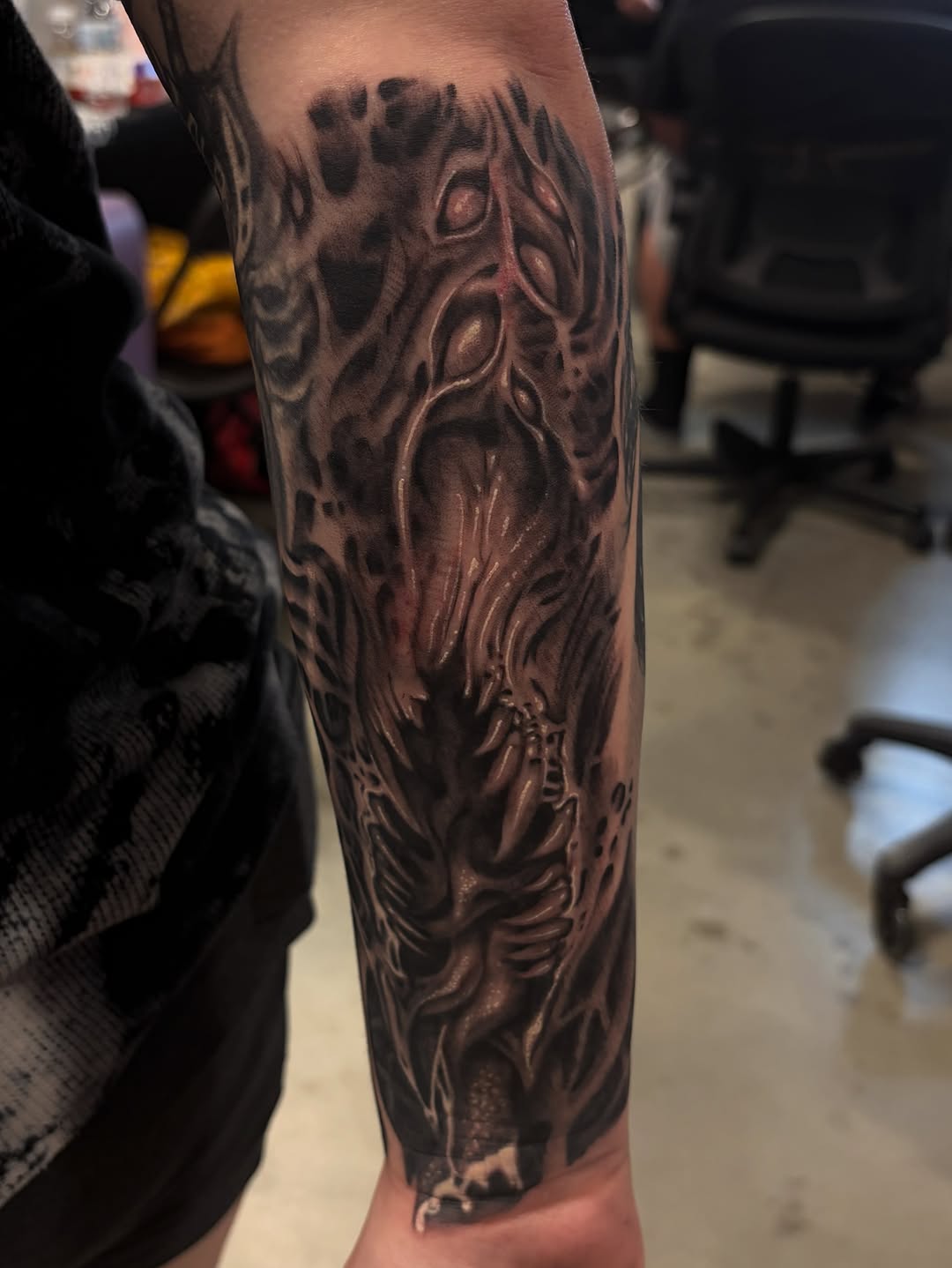 Tattoo by @inkedbycahela — dark_realism, black_and_grey