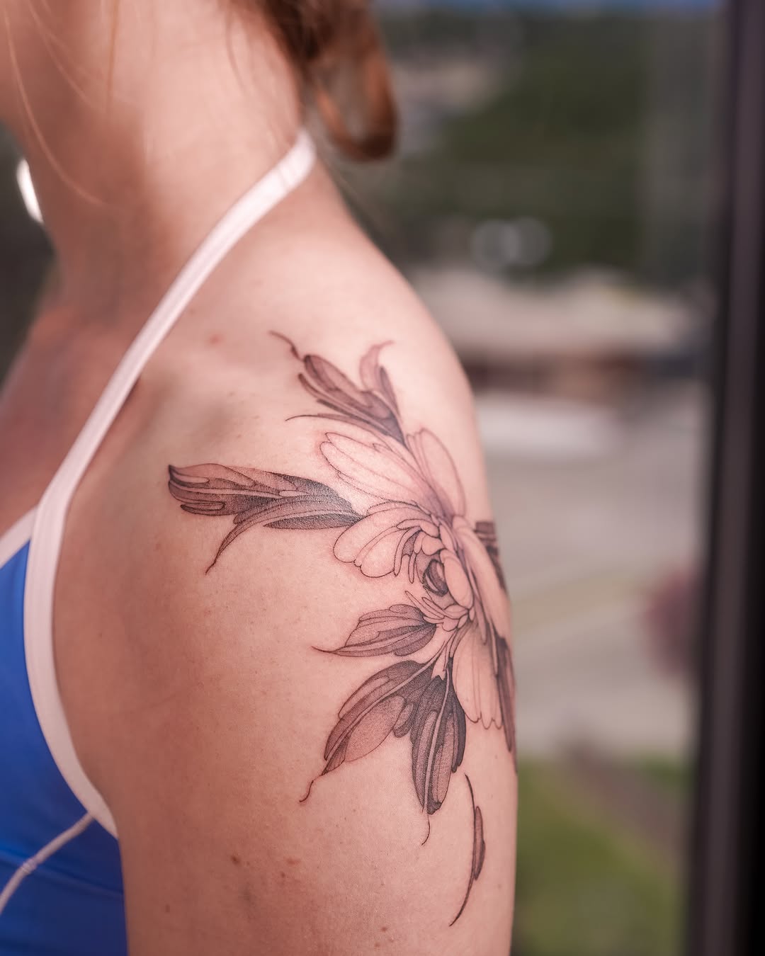 Tattoo by @yomiko.art — fine_line, black_and_grey