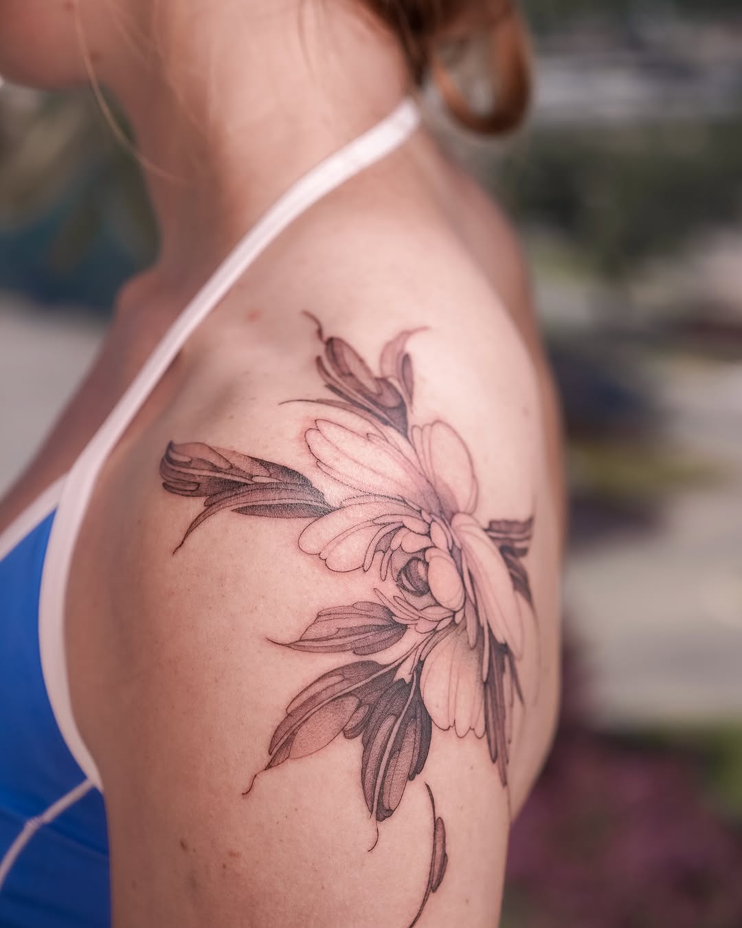Tattoo by @yomiko.art — black_and_grey, realism