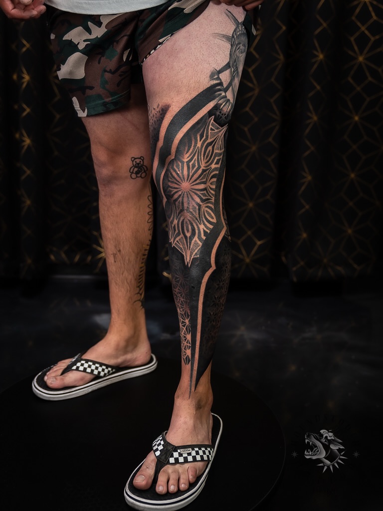 Tattoo by @sacredhound.ttt — blackwork, geometric
