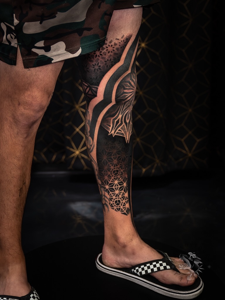 Tattoo by @sacredhound.ttt — geometric, blackwork