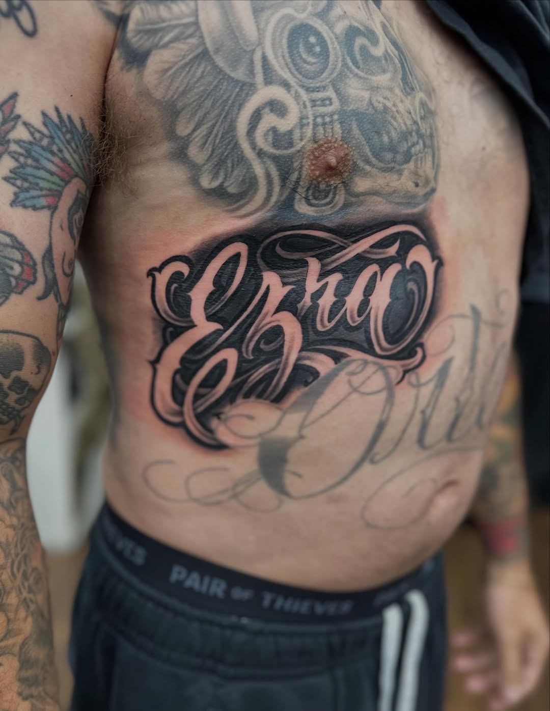 Tattoo by @rubenruiz_tattoos — lettering_script, blackwork
