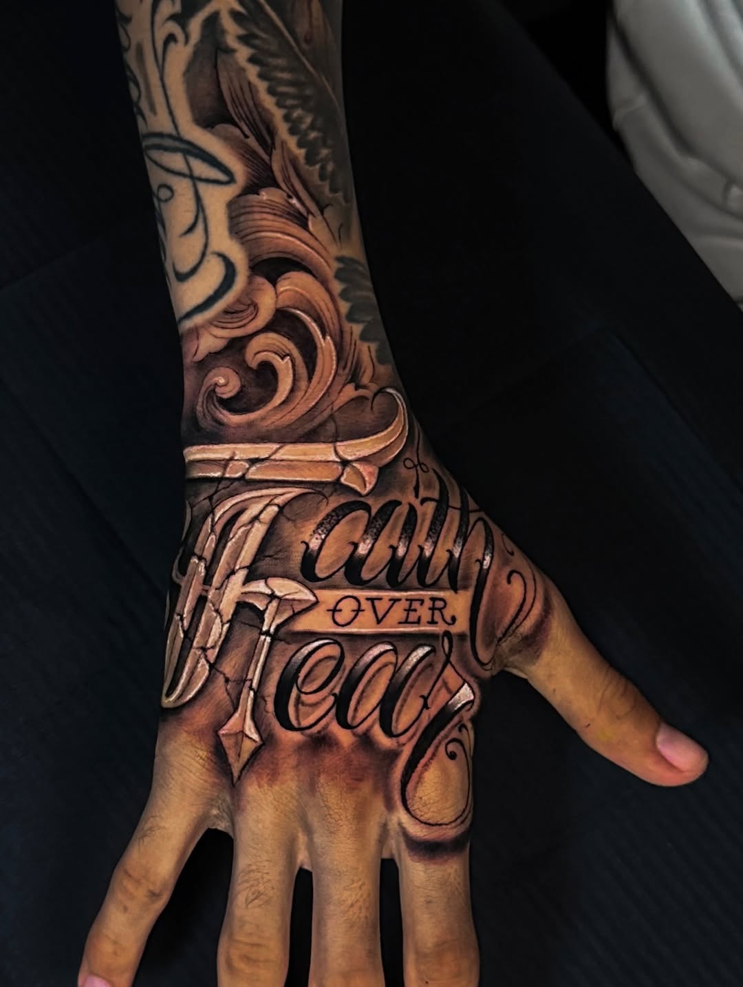 Tattoo by @sherifftattoos — lettering_script, black_and_grey
