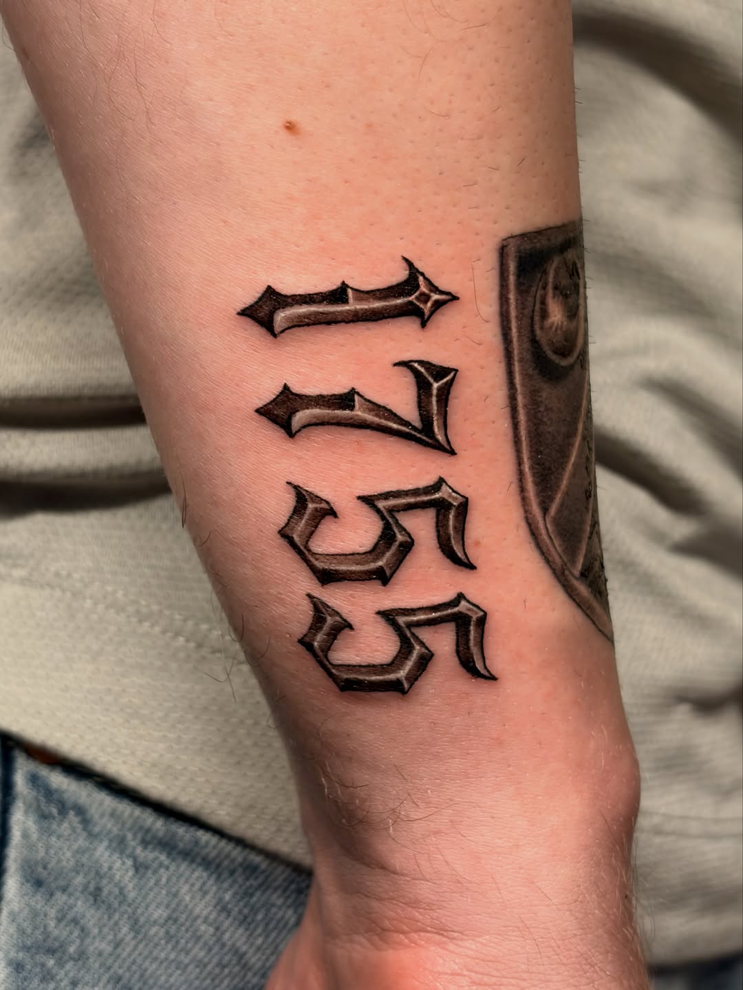 Tattoo by @alexmoska_tattoo — lettering_script