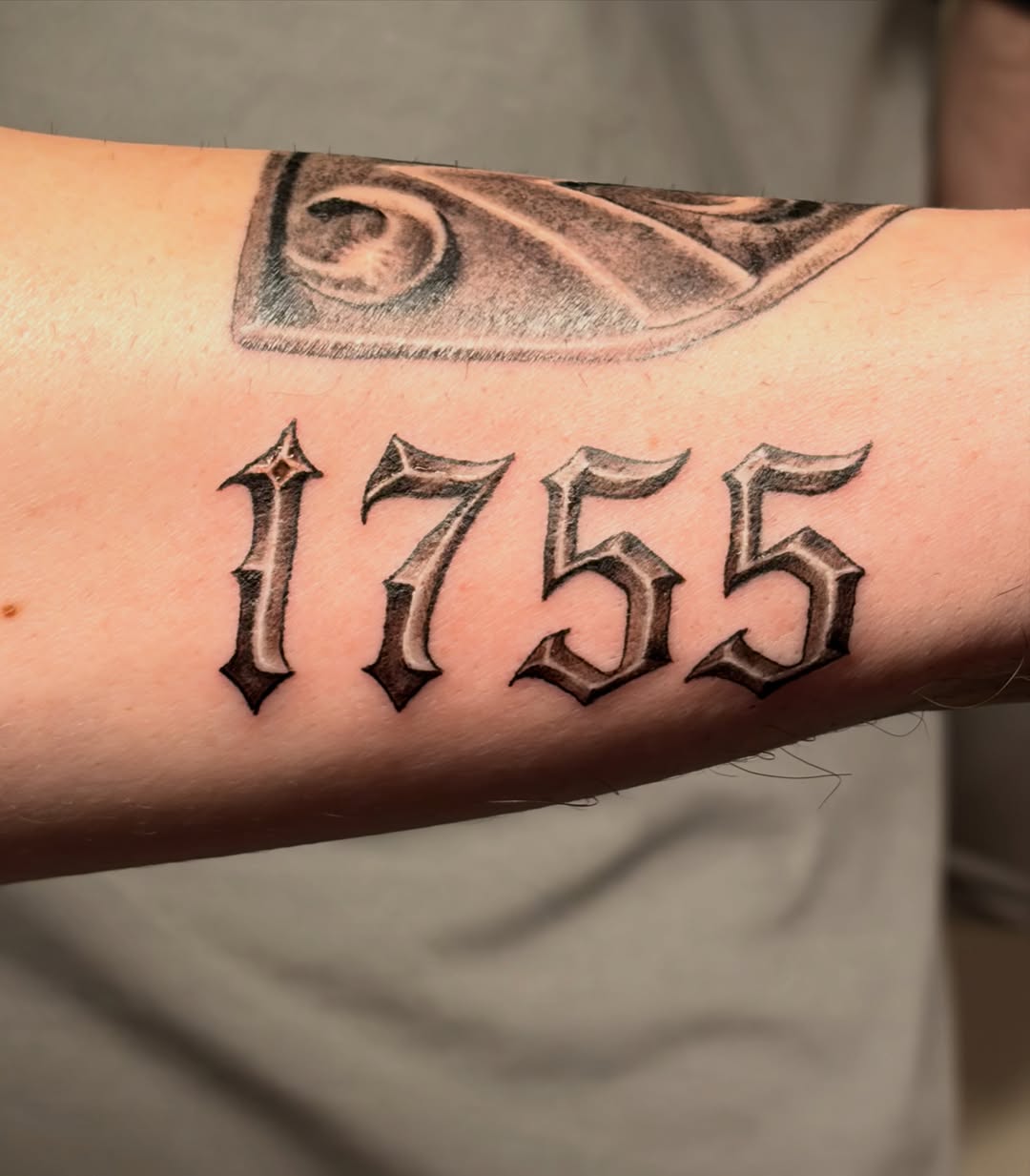 Tattoo by @alexmoska_tattoo — lettering_script, black_and_grey