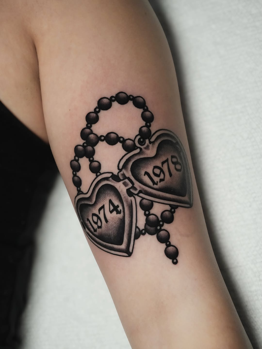Tattoo by @robinson.tattoo โ black_and_grey, lettering_script