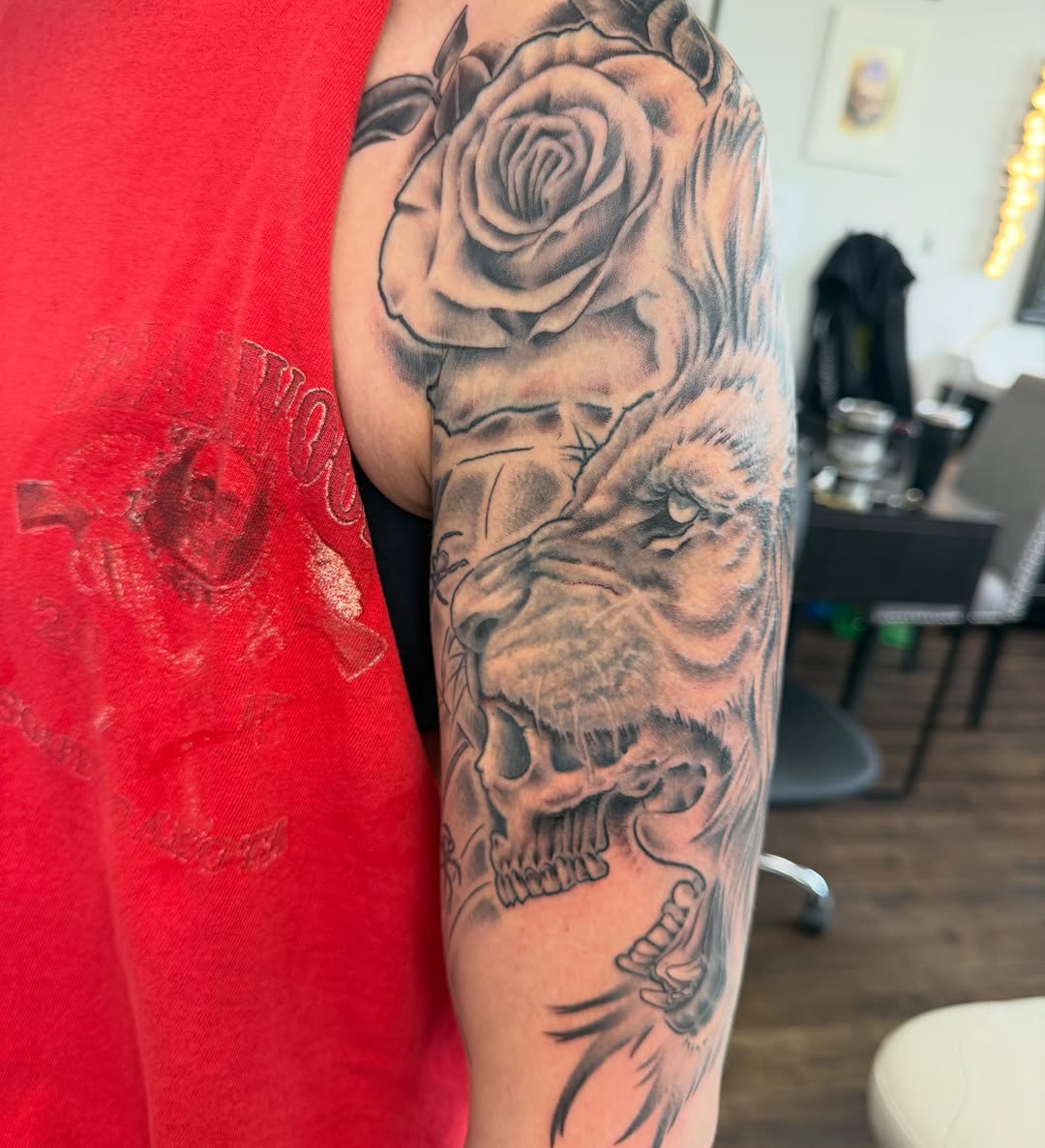 Tattoo by @streetmeat.tat — realism, black_and_grey