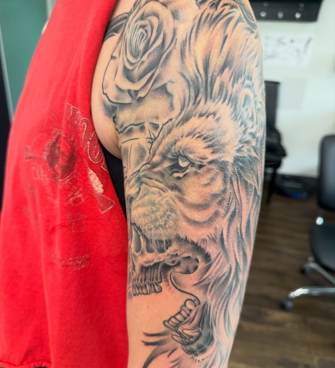 Tattoo by @streetmeat.tat — realism, black_and_grey