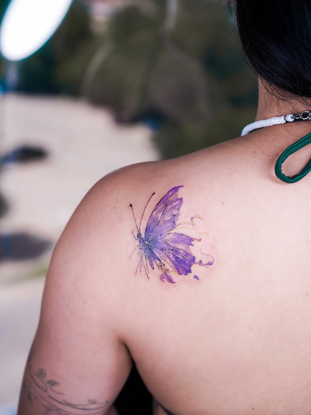 Tattoo by @yomiko.art — watercolor, fine_line