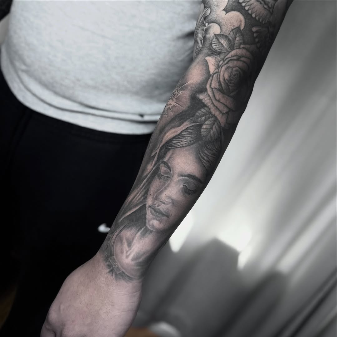Tattoo by @yowmadfboy — realism, black_and_grey
