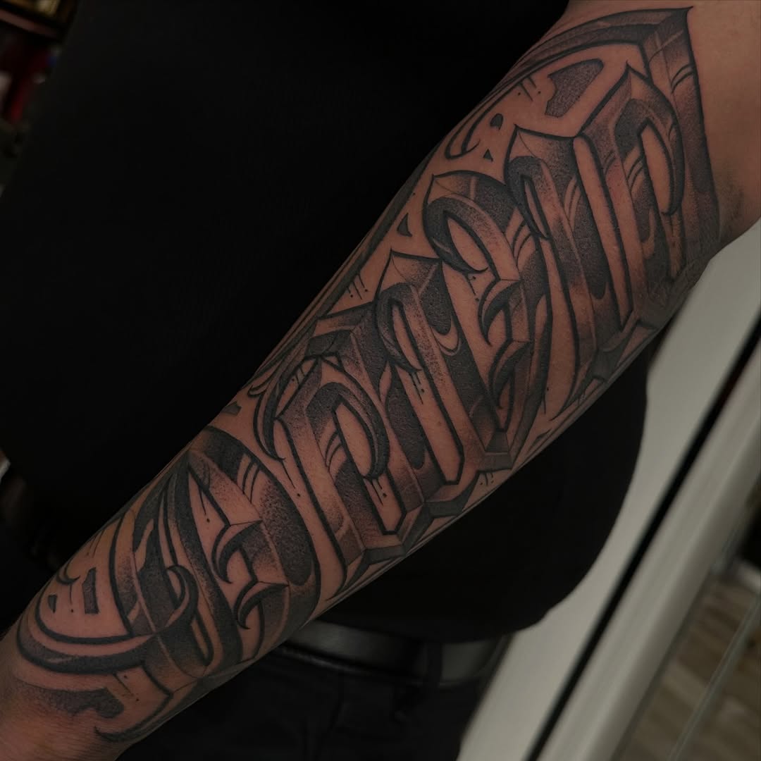 Tattoo by @mottatattoos โ lettering_script, chicano