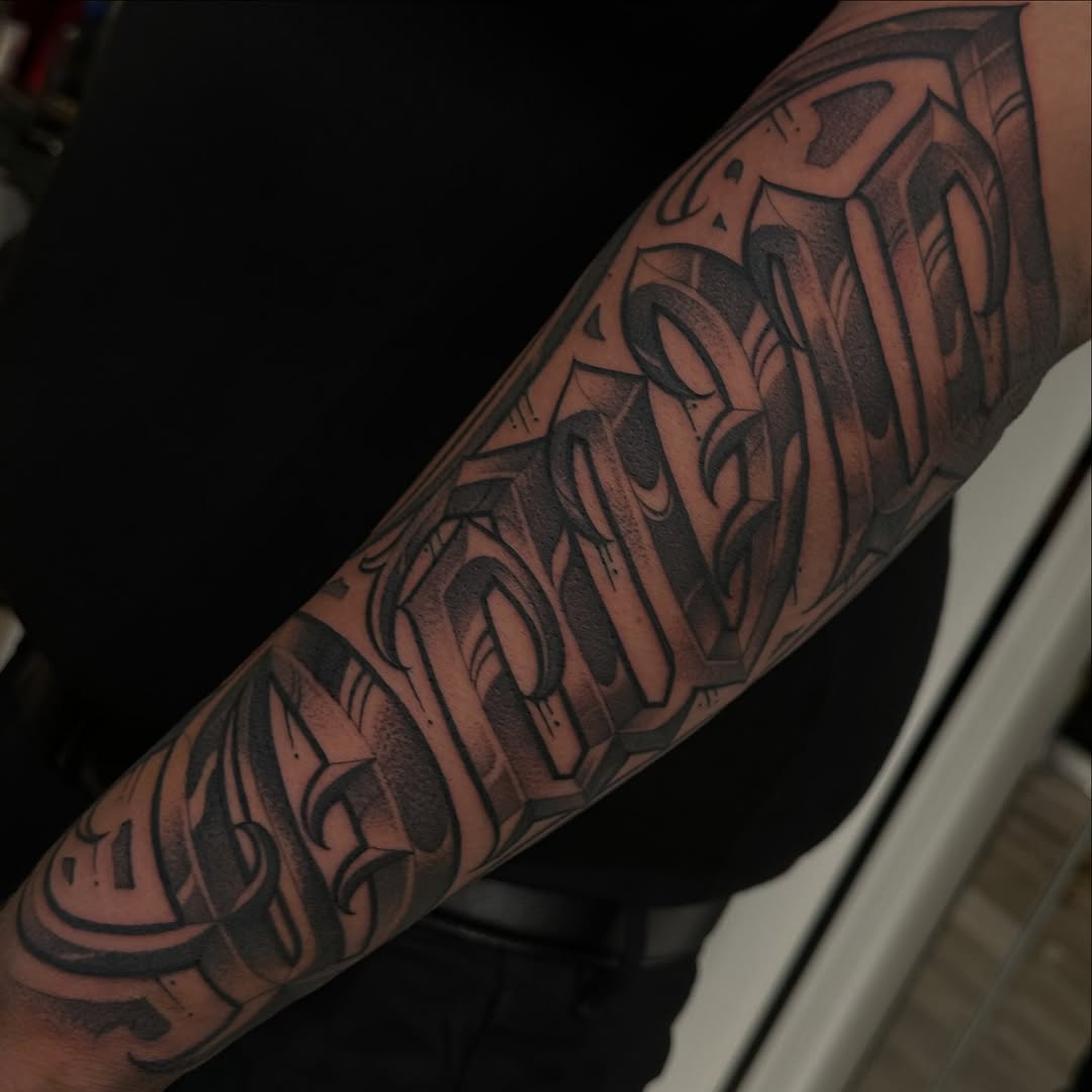 Tattoo by @mottatattoos โ lettering_script, chicano