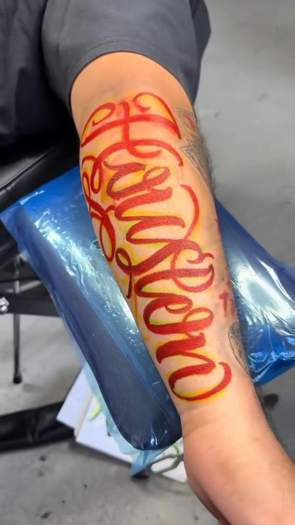 Tattoo by @tattoosxd__ — lettering_script, illustrative
