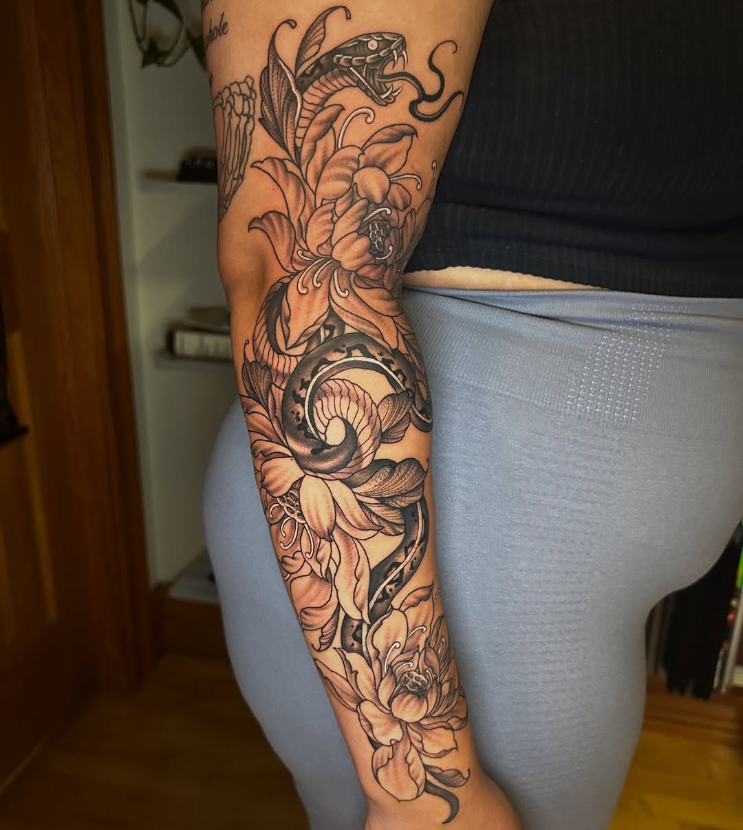 Tattoo by @tattoosbyberlin — black_and_grey, realism