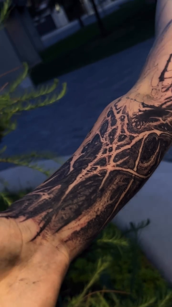 Tattoo by @grimlurk.ink — blackwork, geometric
