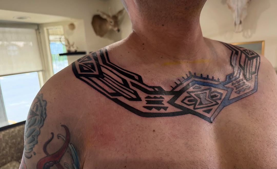 Tattoo by @manuinkatx — tribal, blackwork