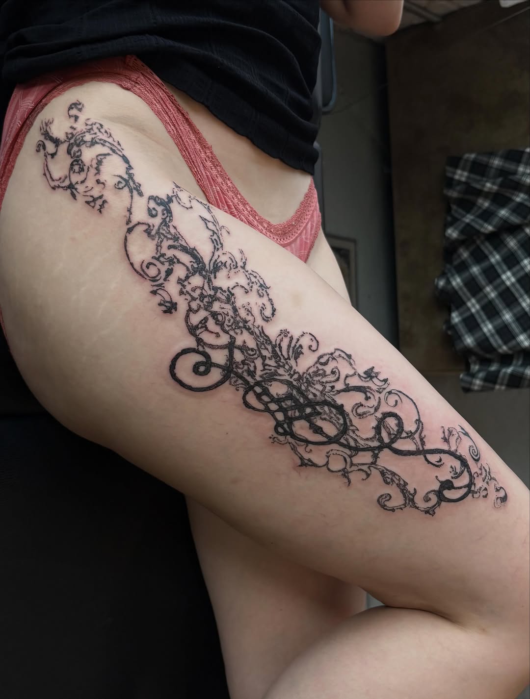 Tattoo by @spikecharms — illustrative, blackwork