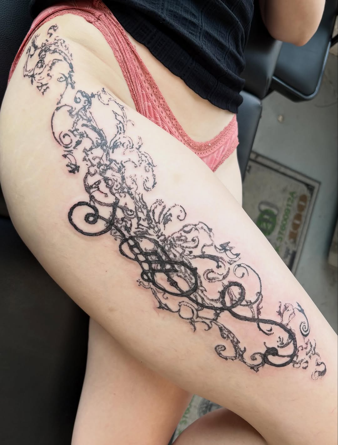 Tattoo by @spikecharms — illustrative, blackwork