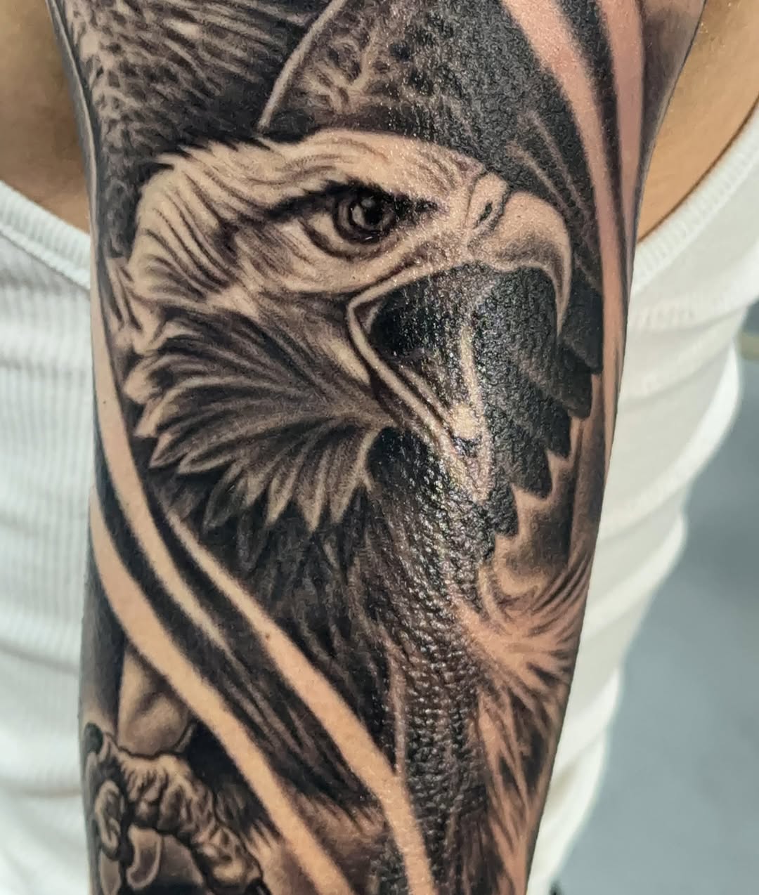 Tattoo by @aleman.adan — realism, black_and_grey
