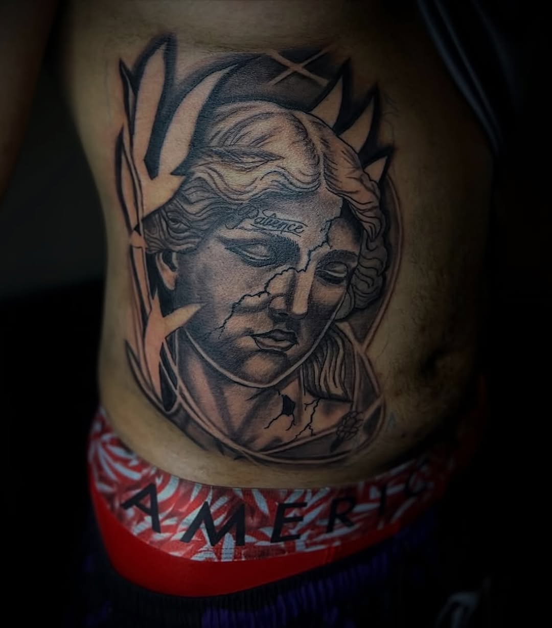 Tattoo by @tattsbyleek โ realism, black_and_grey