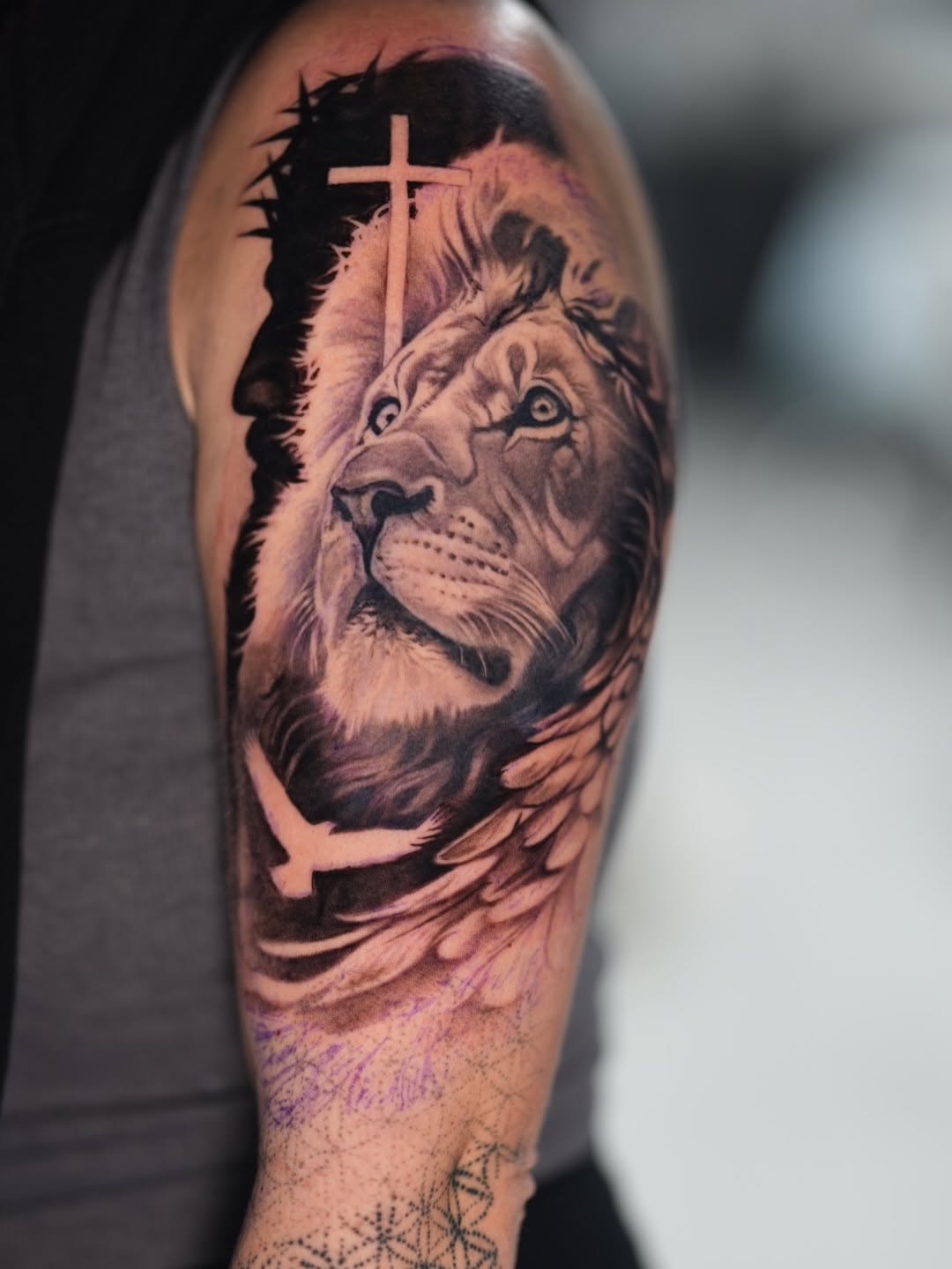 Tattoo by @joey_hella — realism, black_and_grey